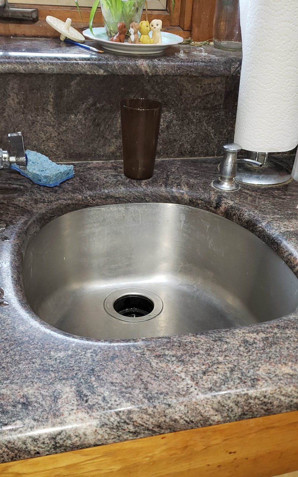 Undermount sink reinstalled flush to granite countertop